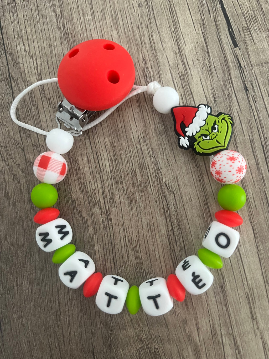 Attache tétine Grinch Noël personnalisée