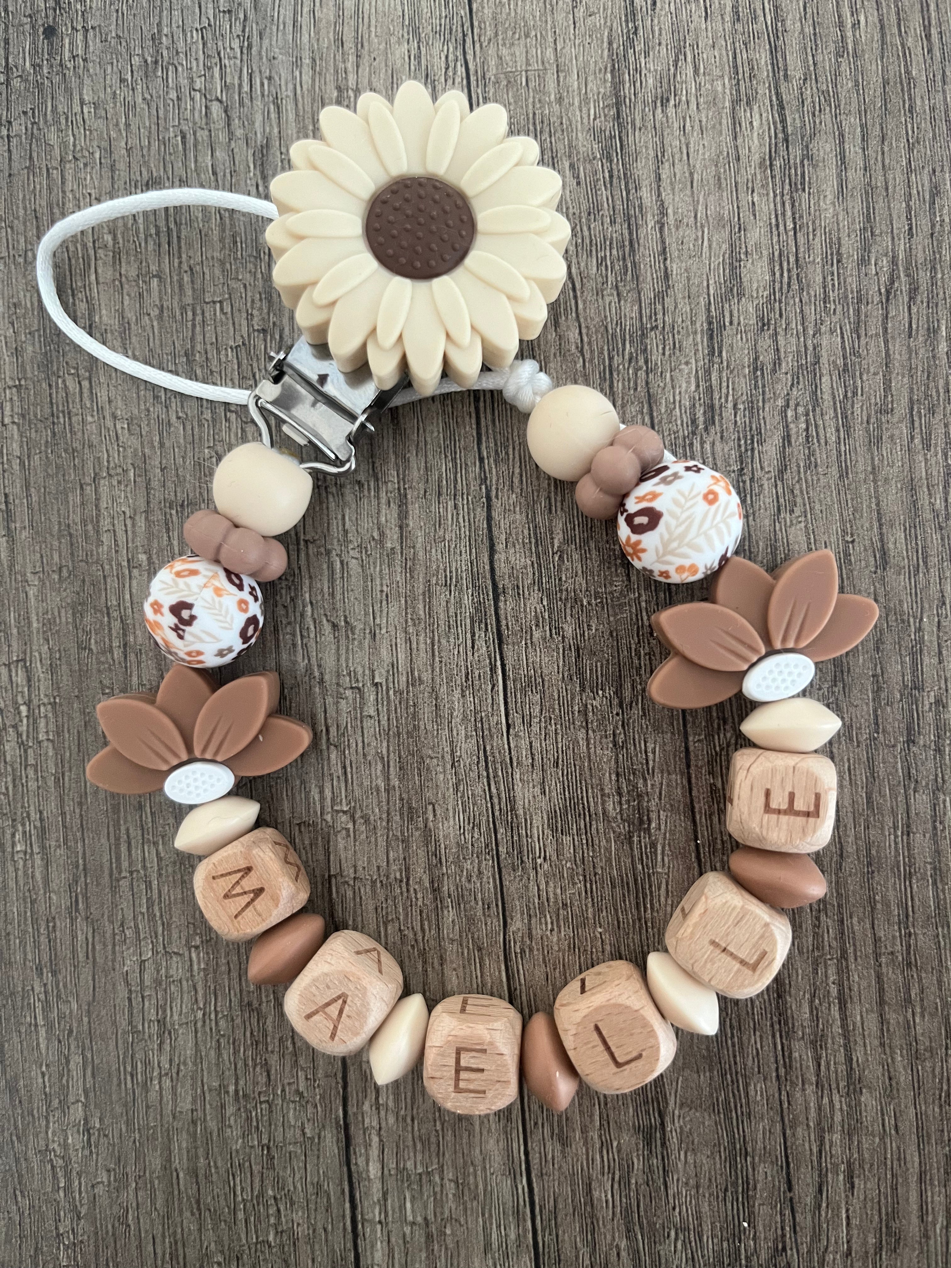 Attache tétine Fleurs tournesol bois personnalisée