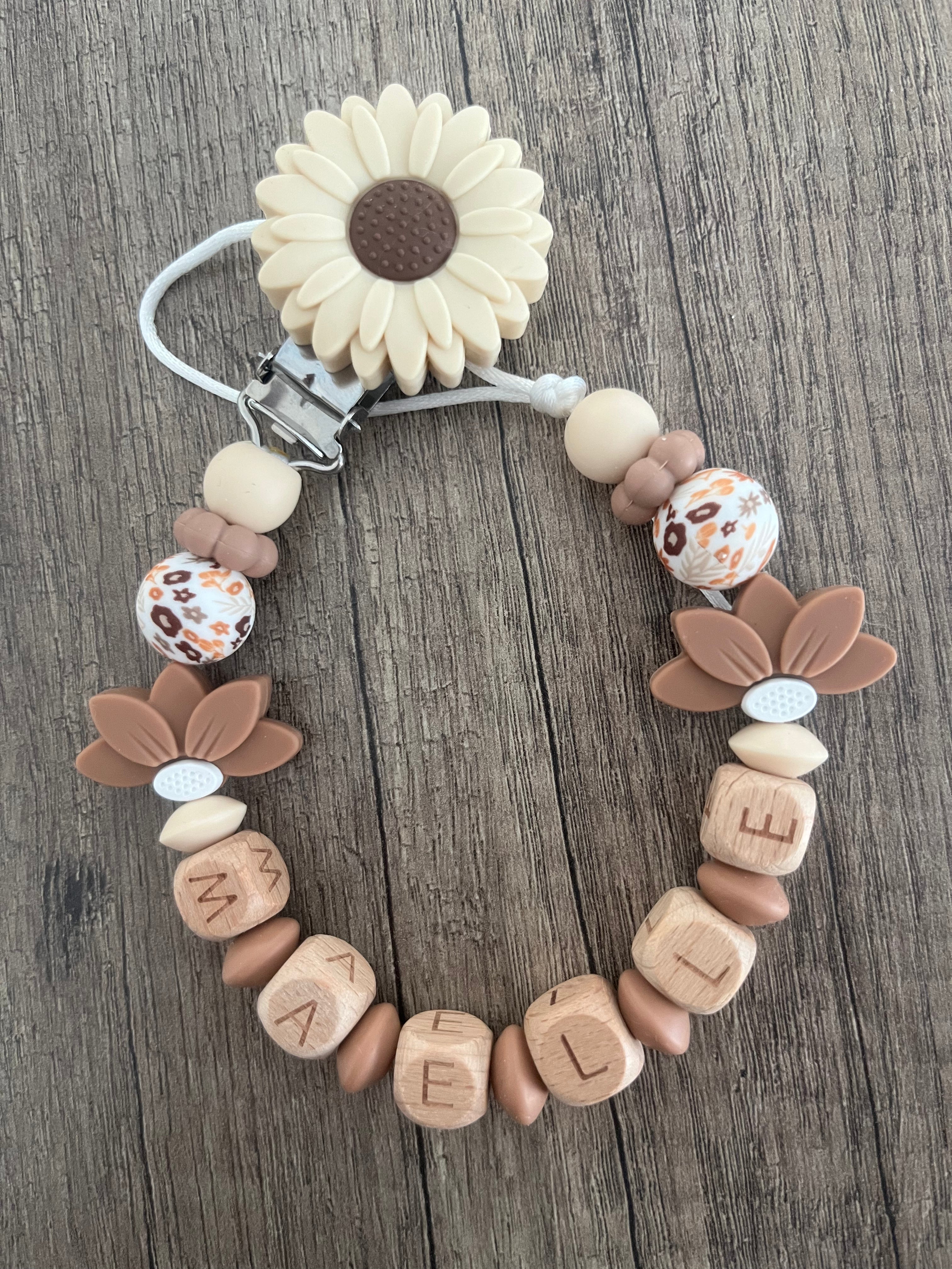Attache tétine Fleurs tournesol bois personnalisée