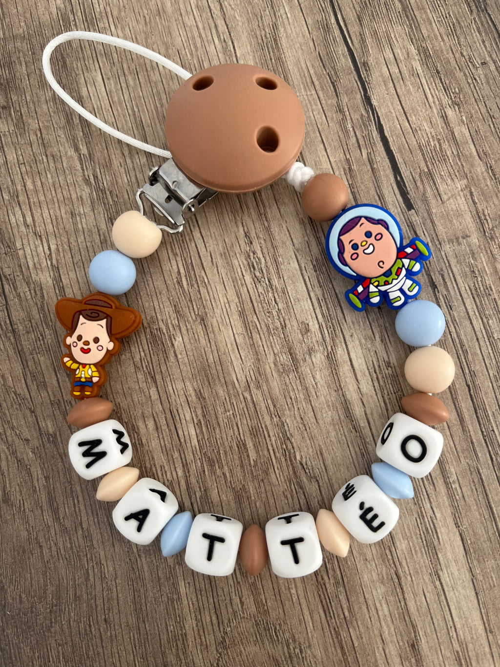 Attache tétine Toy Story Buzz L’éclair Woody personnalisée
